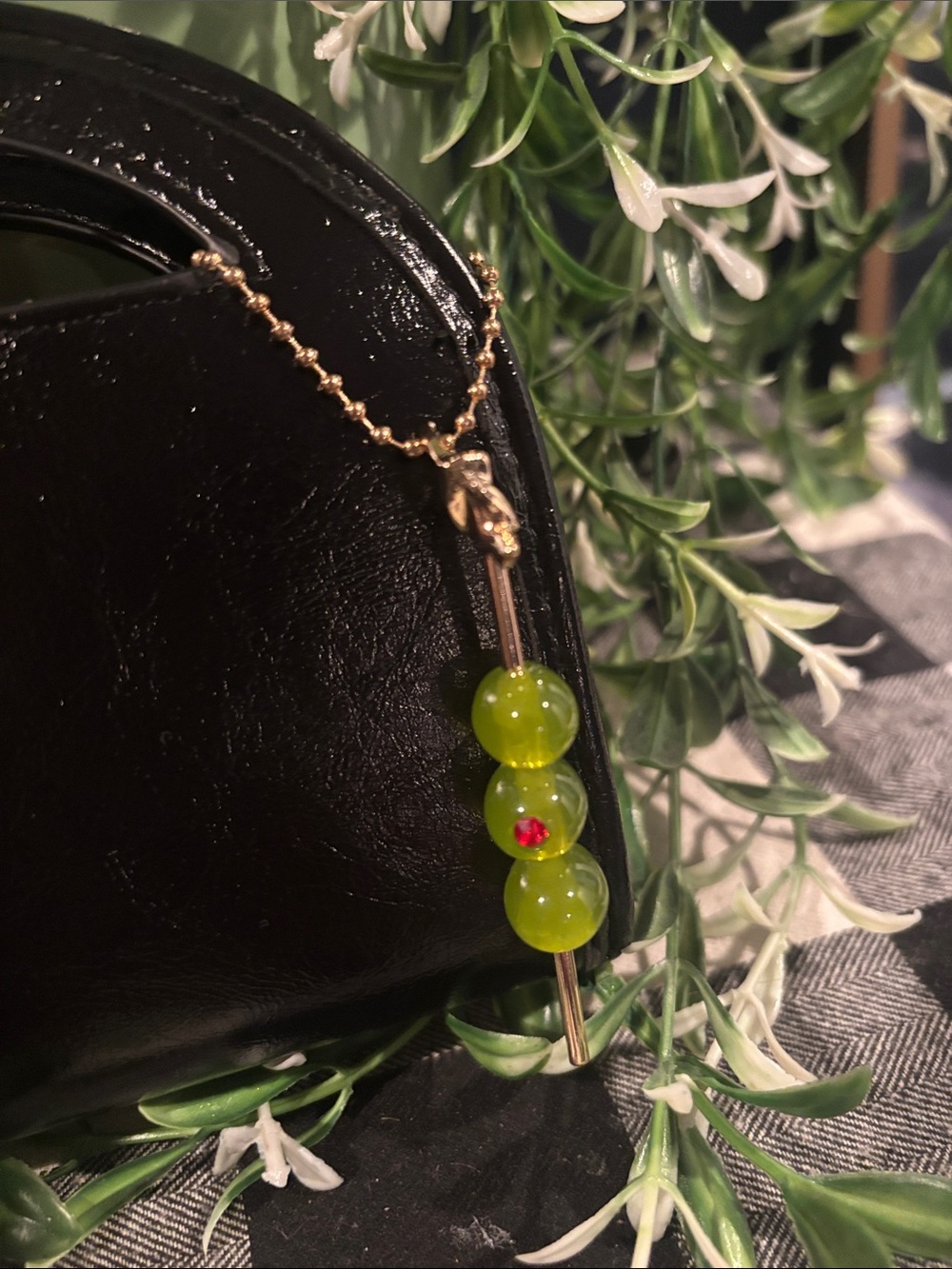 Black Mini Leather Arch Handle Clutch with Gold Chain and Green Beaded Charm - Picture 2 of 6